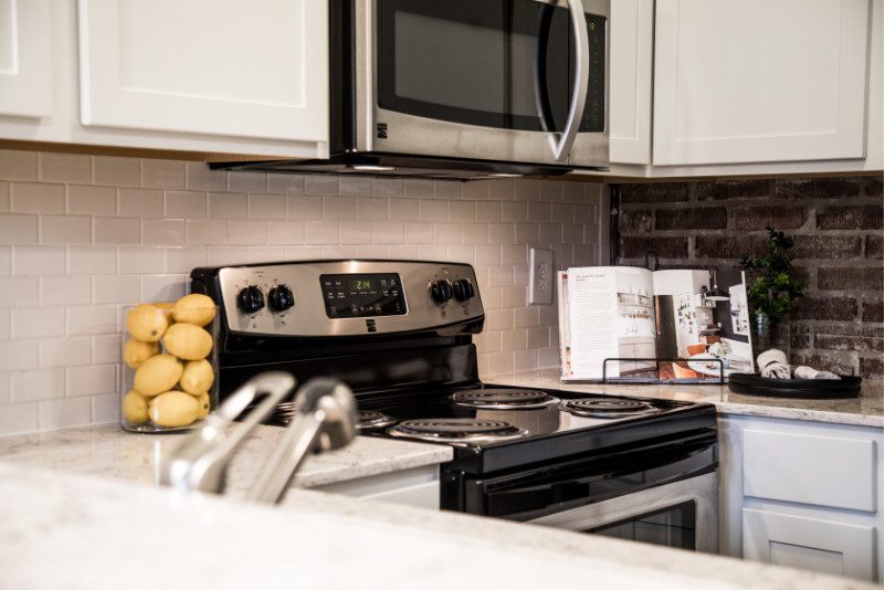 kitchen with stainless steel appliances and white appliances